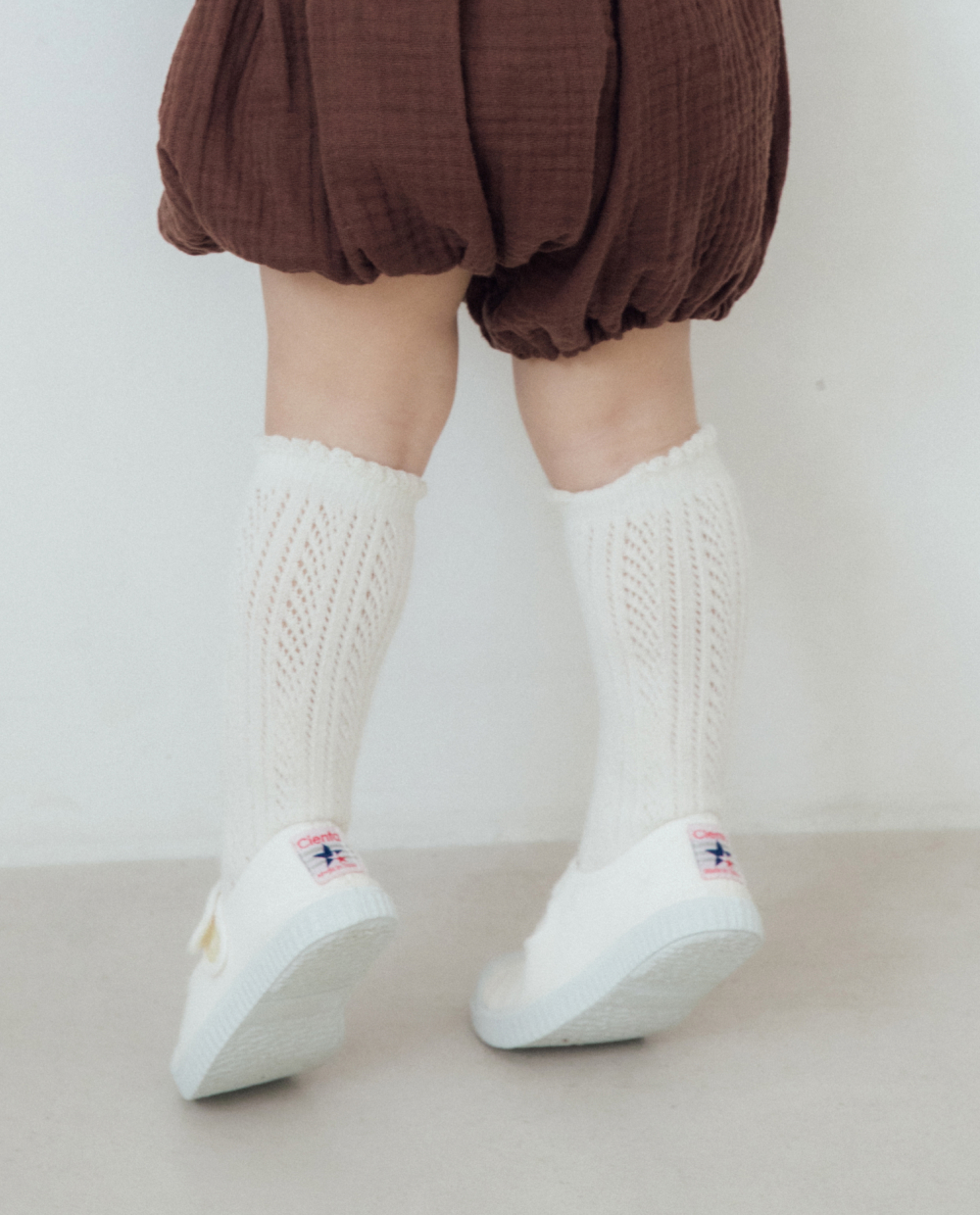 グリップ&グロウ アイレット ニーソックス